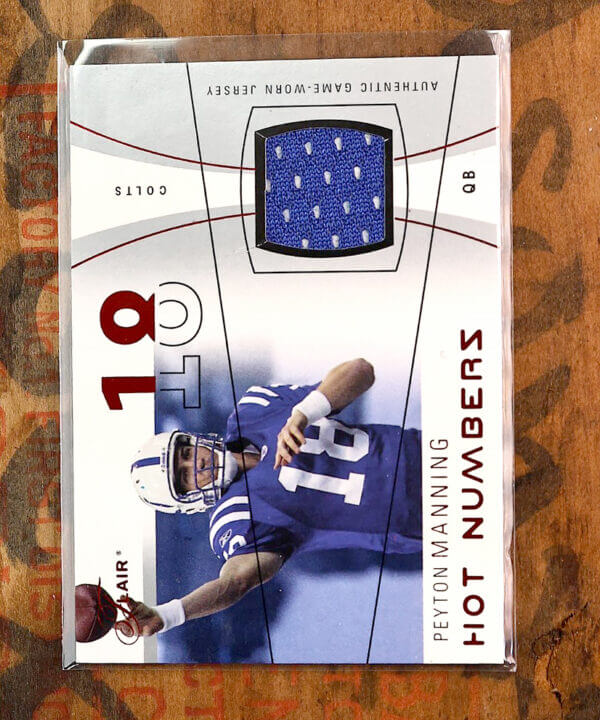 2004 Flair Peyton Manning Hot Numbers Red /150 Card #HNPM COLTS